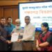 শহিদ পরিবারের পাশে জেলা প্রশাসন: সঞ্চয়পত্র বিতরণ